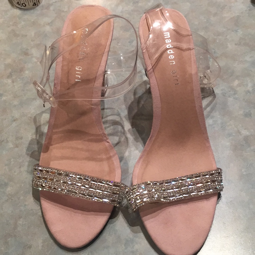 Madden girl clear plastic and shiny strap sandals.